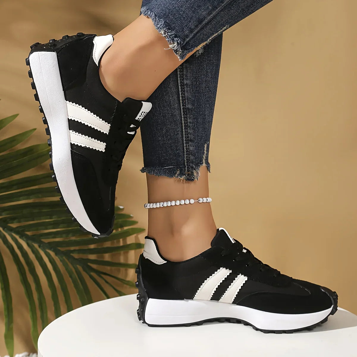 Gestreifte Freizeit-Sneaker CloudLane | Schwarz