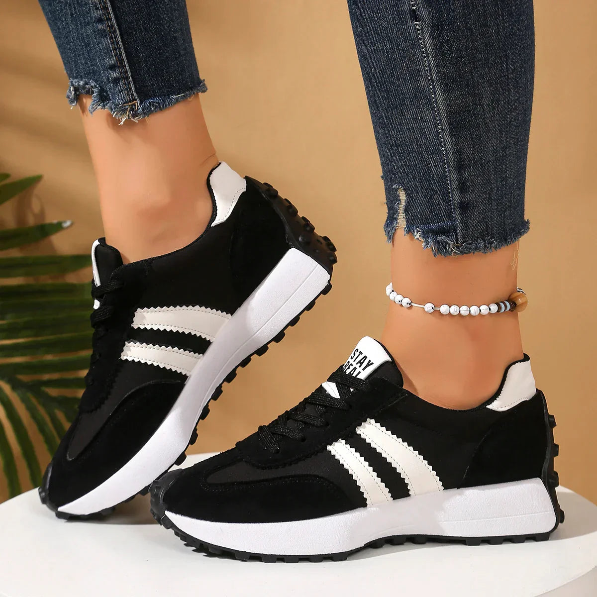 Gestreifte Freizeit-Sneaker CloudLane | Schwarz